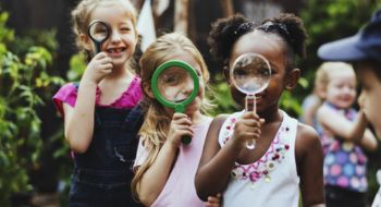 Children smile on a school field trip
